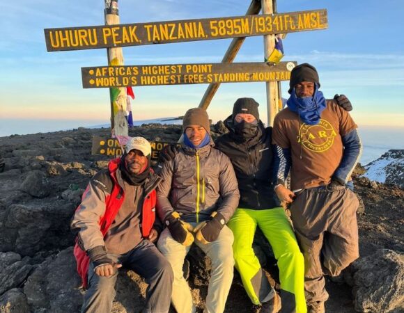 Why we hire porter on a Tanzanian safari?
